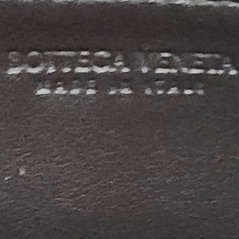 Bottega Veneta Intrecciato Zip-Around Long Wallet.
